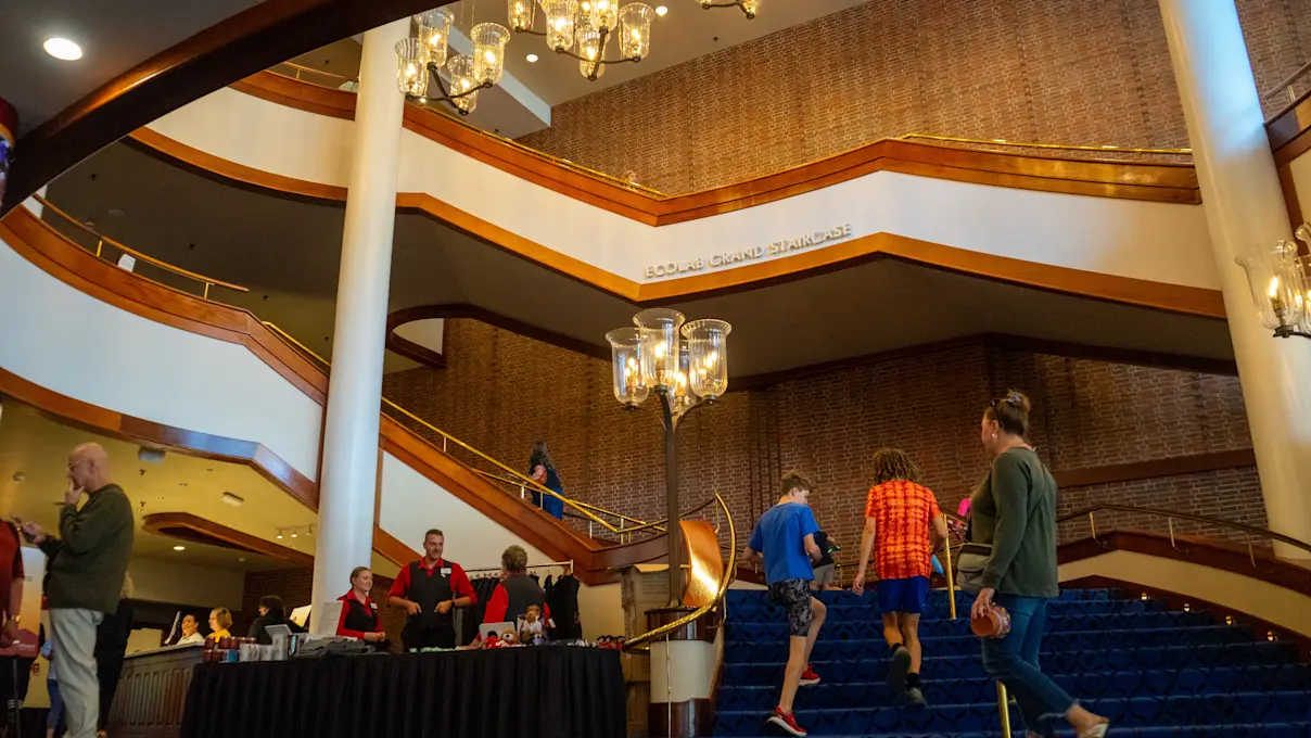 Guests ascending stairs in the Ordway lobby at the 40th Anniversary Open House. Photo by Imani Mansfield.