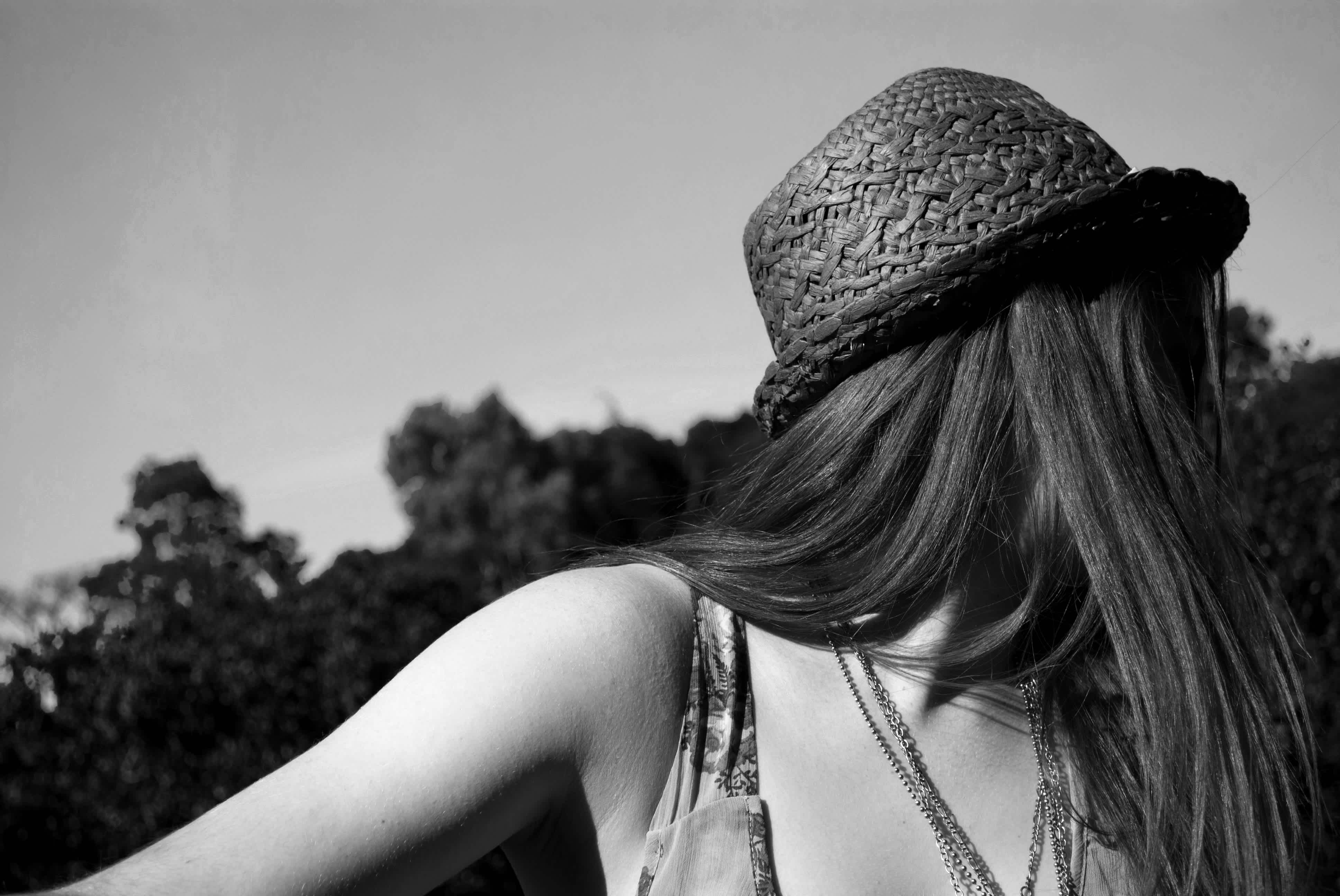 Black and white girl in a hat. 