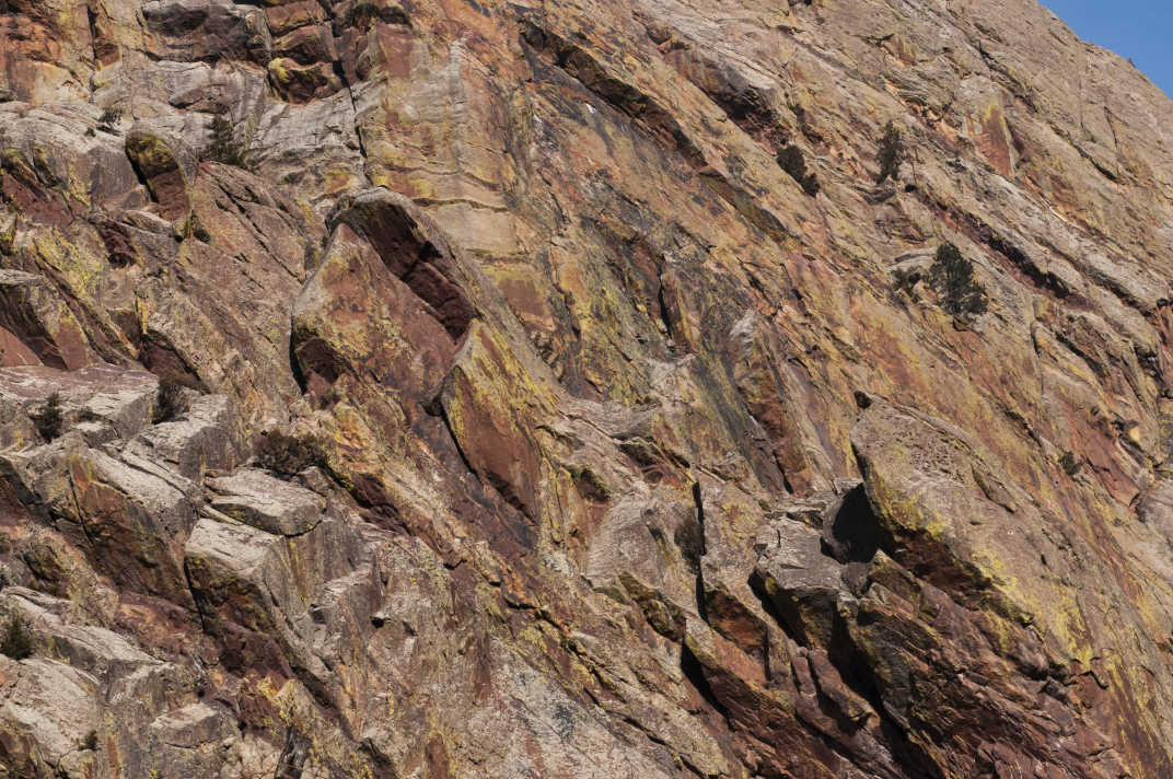 Close up showing details and greens, yellows, oranges, and browns of the cliff face in Eldorado Canyon State Park #Boulder #Colorado #Nature #StatePark #EldoradoCanyon #Details