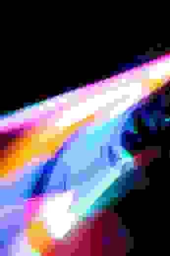 A spectrum of color waves across a black screen