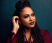 Ava DuVernay with her hand on her face