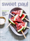 a magazine cover with a bowl of fruit and a spoon