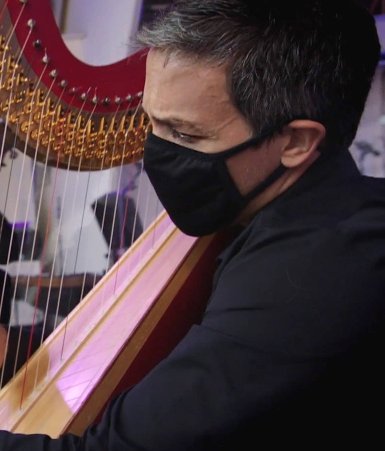 Harpist Emmanuel Ceysson during a performance for SOUND/STAGE.