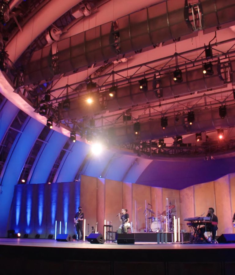 Andra Day and band on the stage of the Hollywood Bowl performing “Rise Up,” the unofficial anthem of the movement