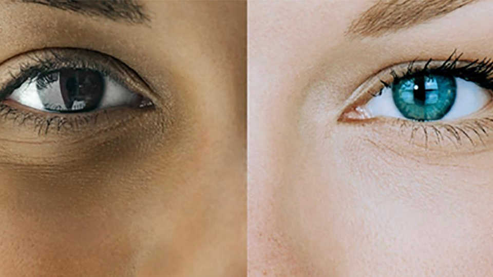 Side-by-side close-up photo of two different colored eyes on two different people.
