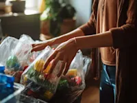 Woman sorting plastic