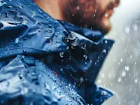 Man wearing water repellant clothing