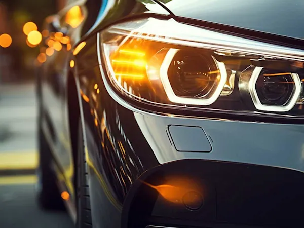 Plastic headlight on a modern car