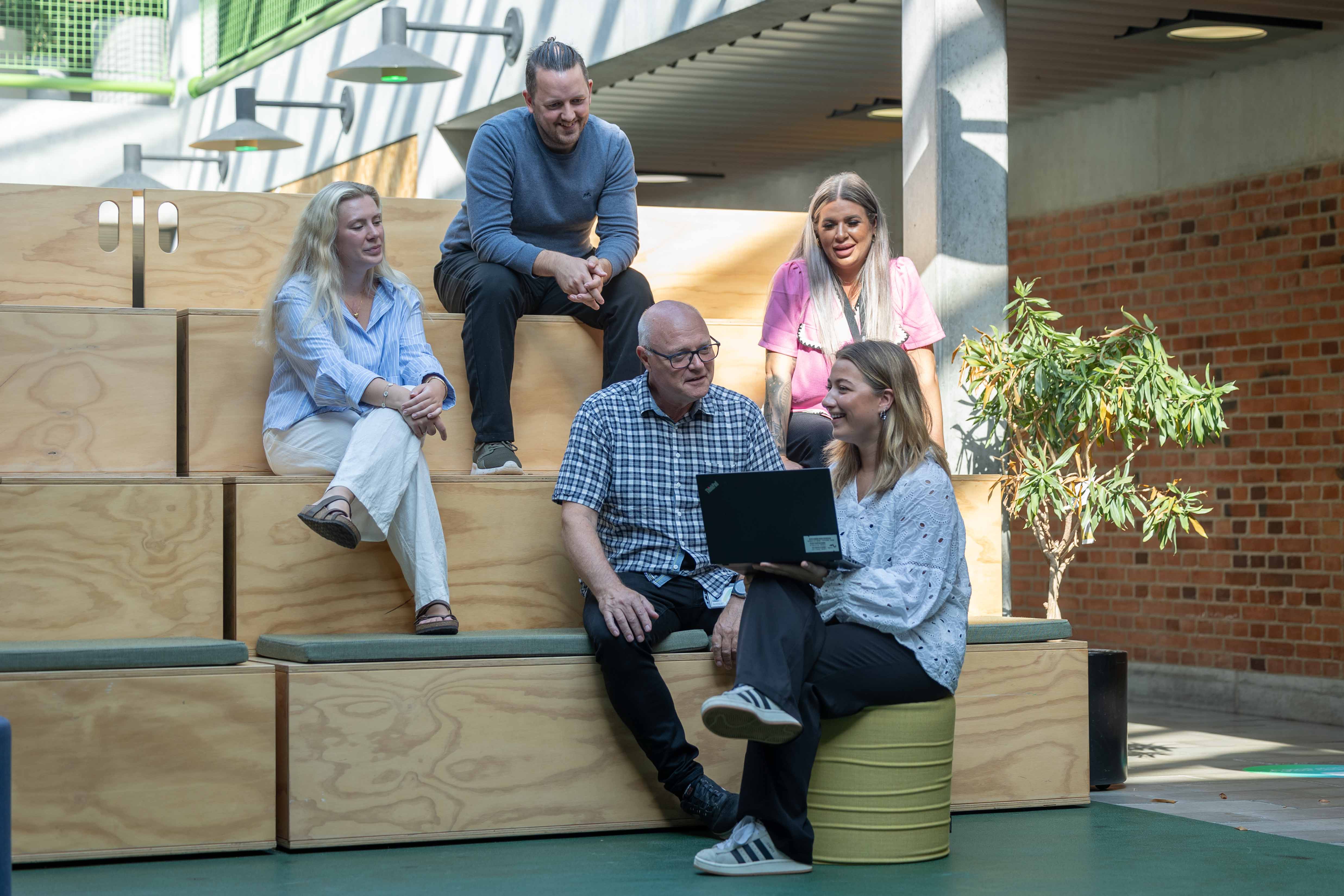 TDC_Brands_internal_employees_sitting_2026