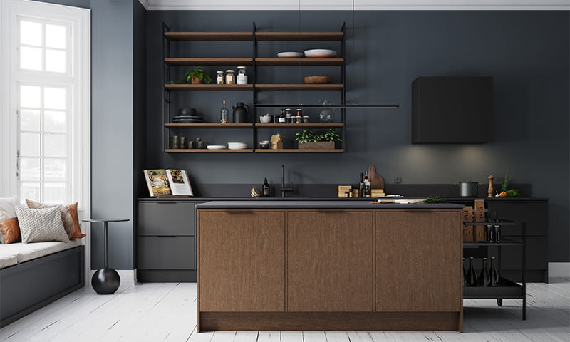 Moderne kjøkken med mørkegrå vegger, tre-øy, svarte hyller med servise og vindusbenk med puter