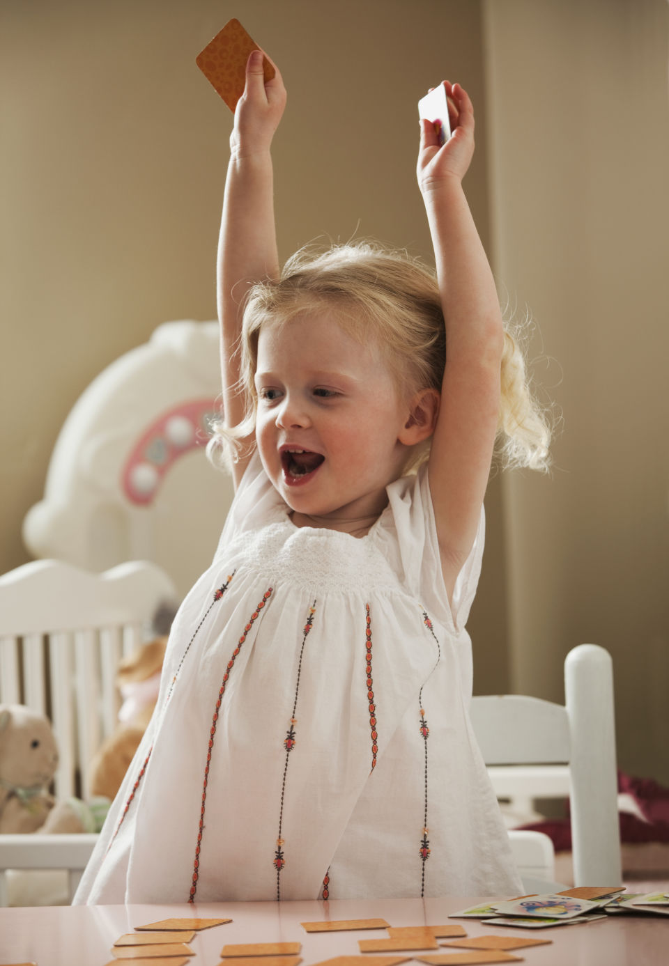 Girl throwing arms up excited