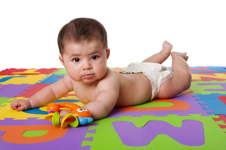 Baby Laying on Colorful Foam Mat