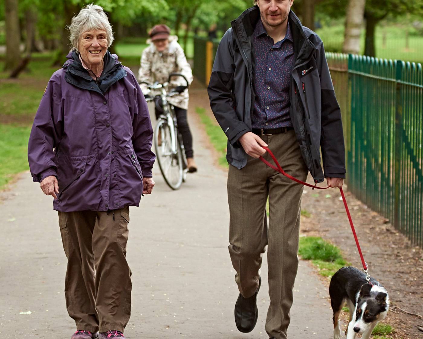 Two people walking in the park