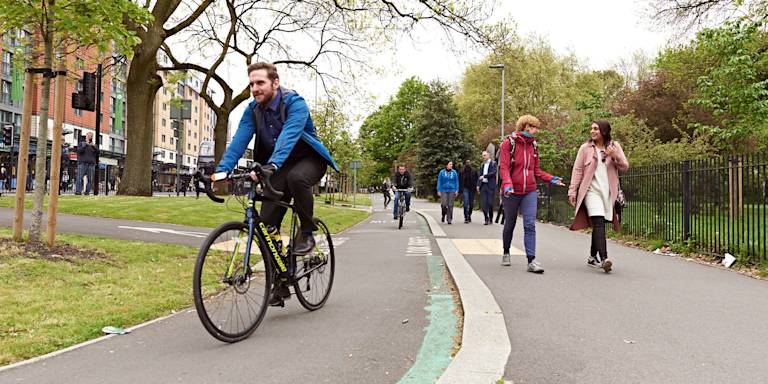 Man riding a bike, commuting to work