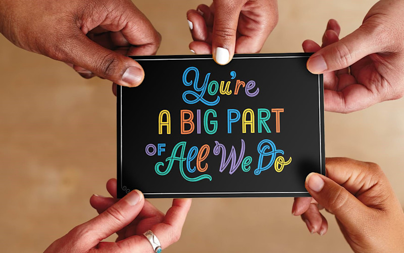 People Holding Employee Appreciation Card ARTICLE HERO IMAGE 2024