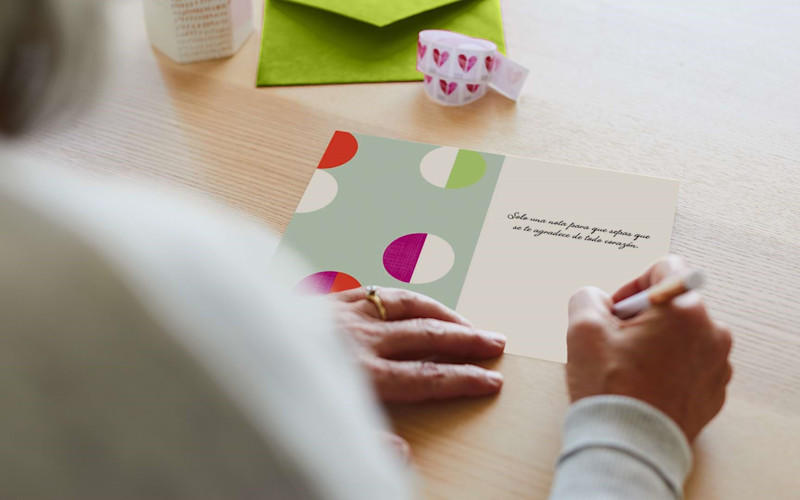 Person Writing in Spanish Card ARTICLE HERO IMAGE