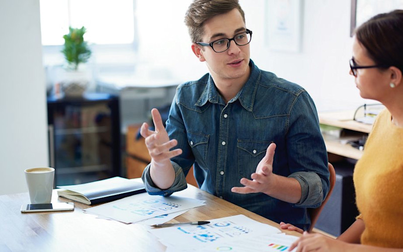 L male female both in glasses working table