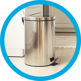 A clean trash bin in a kitchen