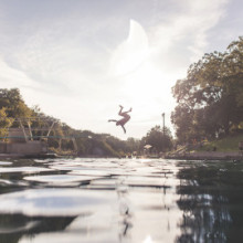 Artwork - Jennifer Sathngham - Silhouetted Man Jumping off Diving Board at Barton Springs