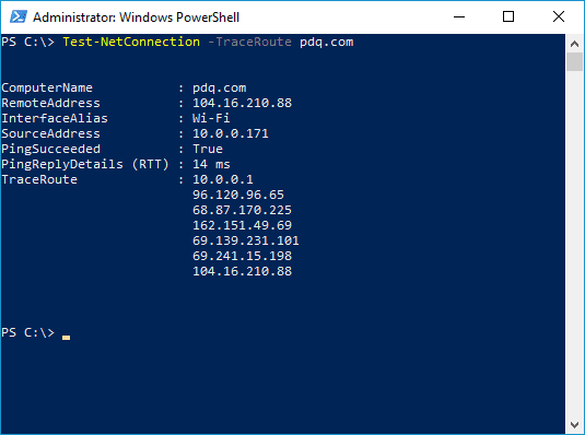 PowerShell Test-NetConnection -TraceRoute command output showing hops to pdq.com with remote address, interface, and ping reply details.