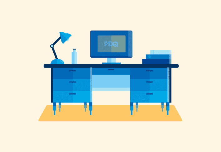Illustration of computer desk and monitor with PDQ logo