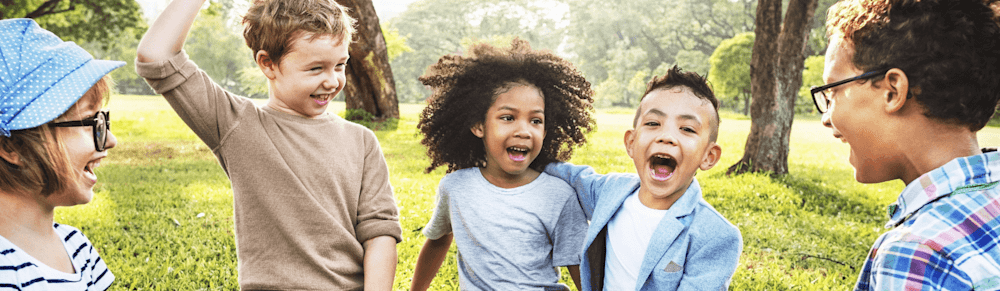 Five kids playing in a park