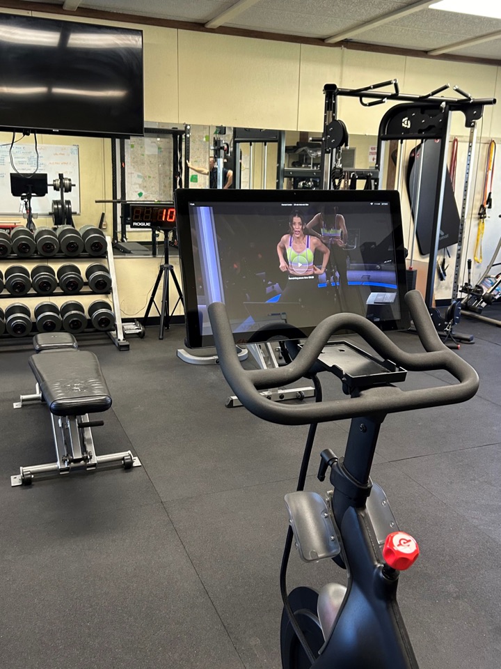Peloton Bike screen in firehouse gym
