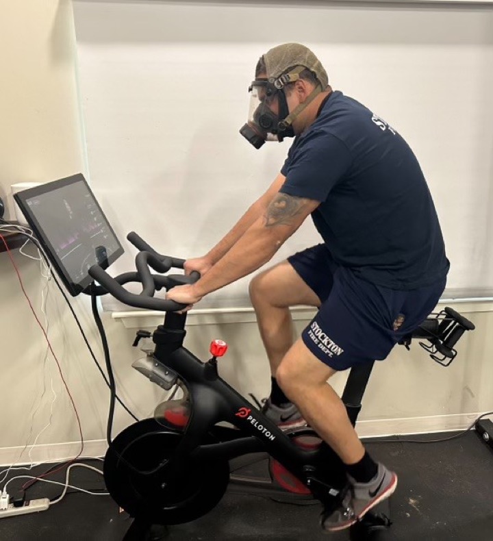 Firefighter on a Peloton Bike