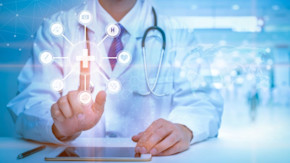 Artificial intelligence and medicine concept with doctor in white coat touching screen
