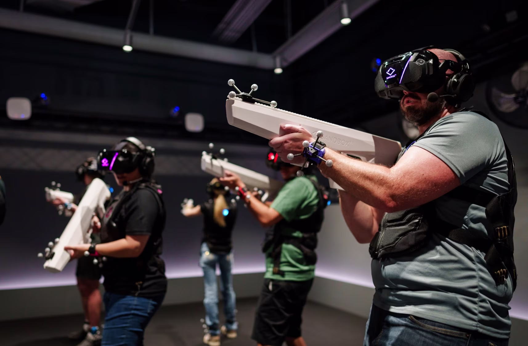 Family playing at Sandbox VR in holodeck