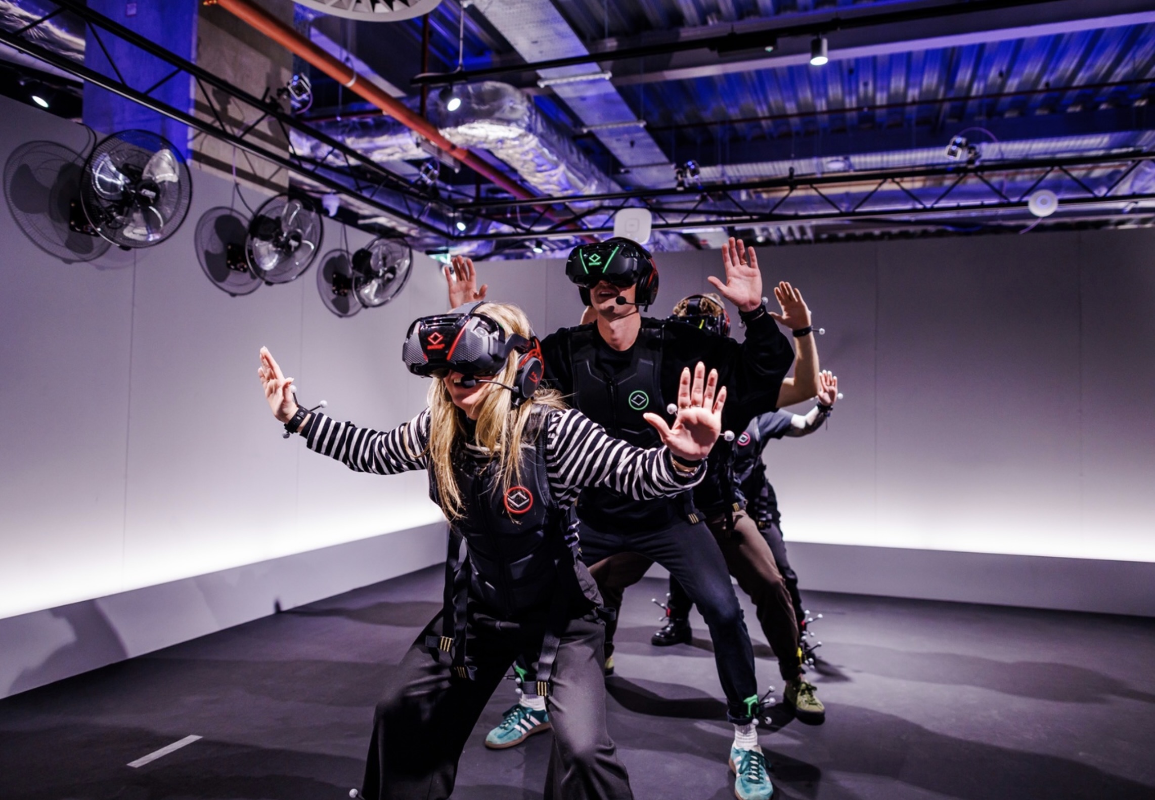 Group of friends playing virtual reality