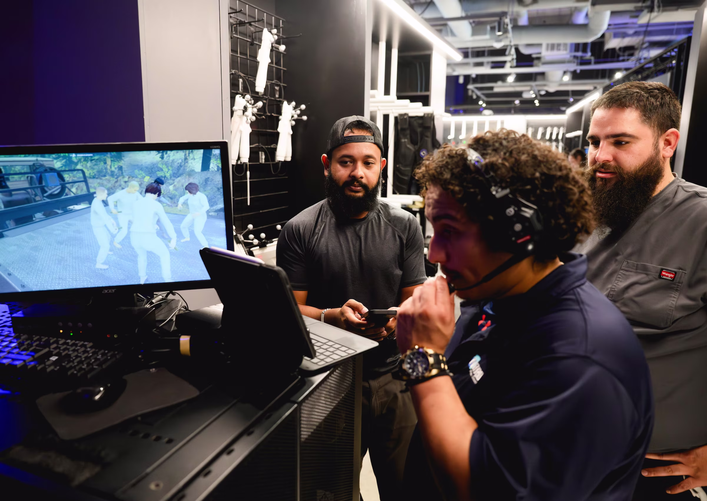 Experience guides observing players in VR