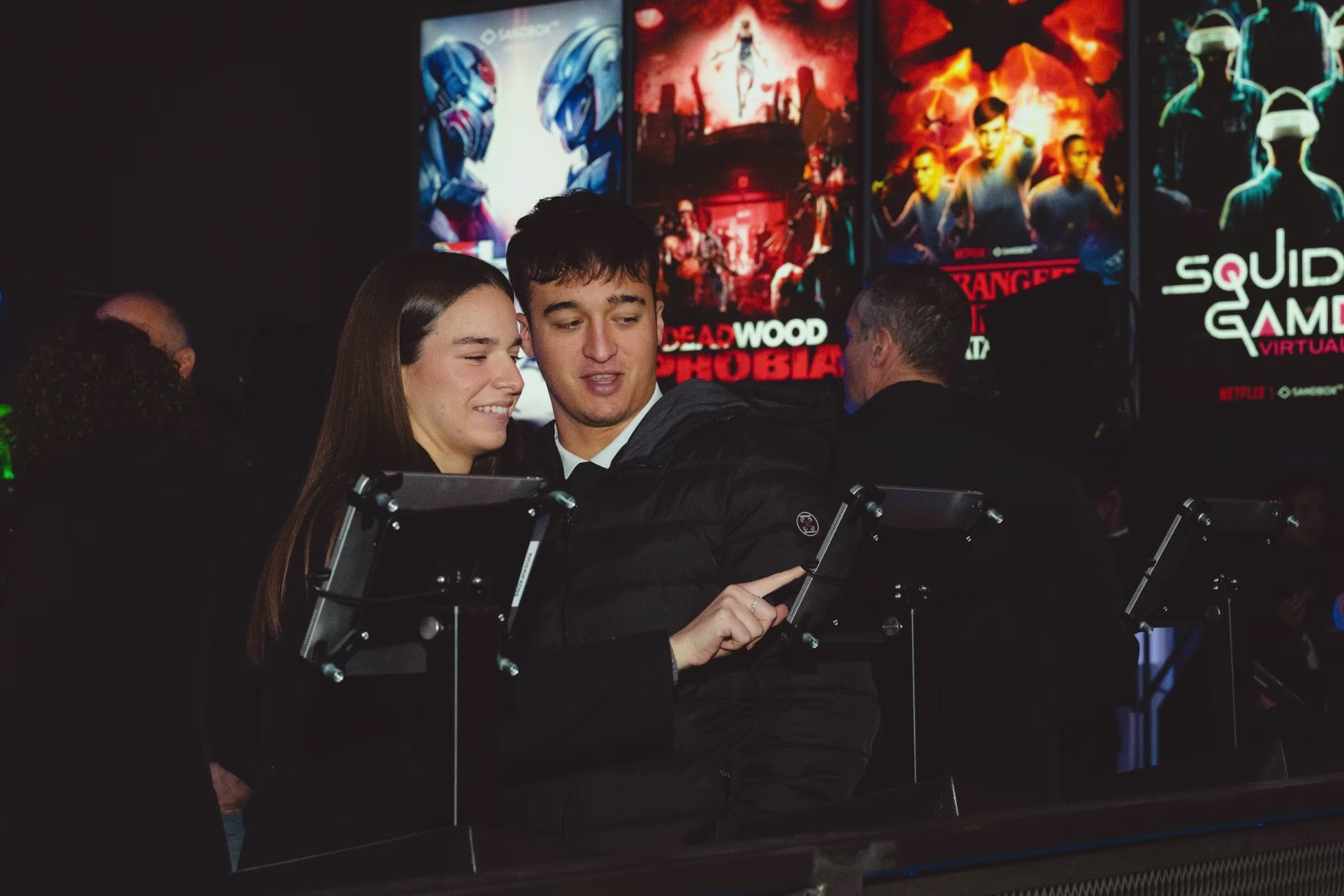 Couple checking into an immersive VR experience