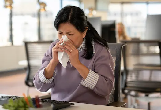 cpro-us-cleaning-portfolio-employee-blowing-her-nose desktop