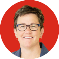 A headshot image of a woman in an aminated background of a circle