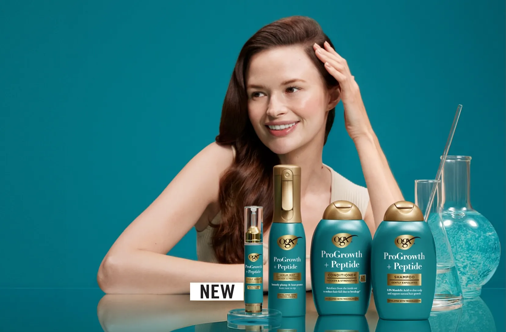 Woman with full hair showcasing Pro Growth + Peptide products