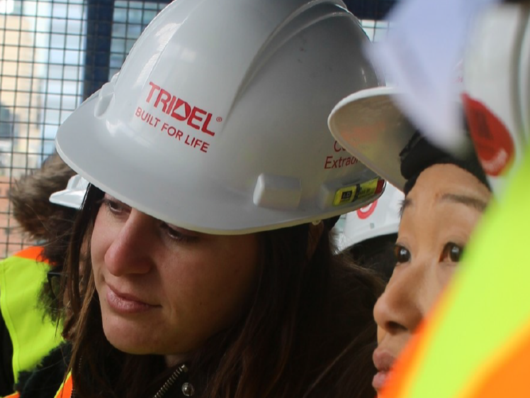 Tridel staffs in hard hat