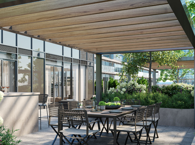 A Suite Balcony with outdoor dining table at The Well Condo