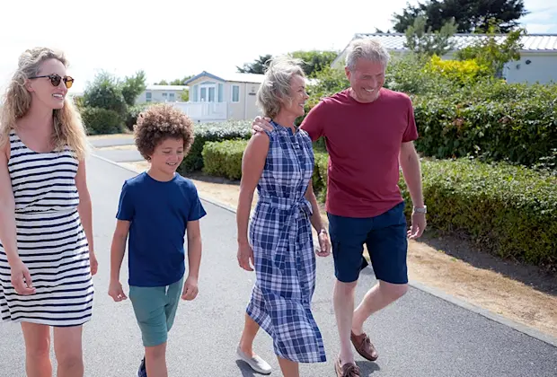 Family walking through a park