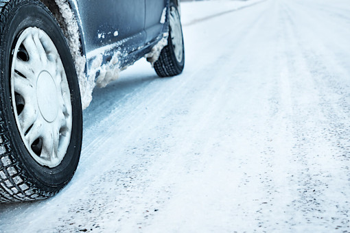 Car driving on snowy road