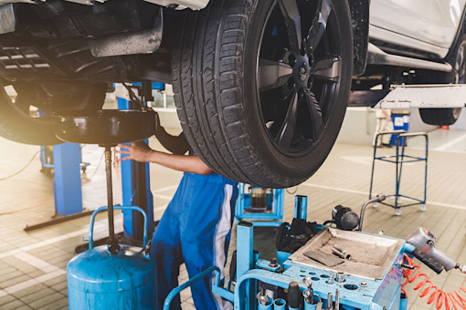 Mechanic working on car
