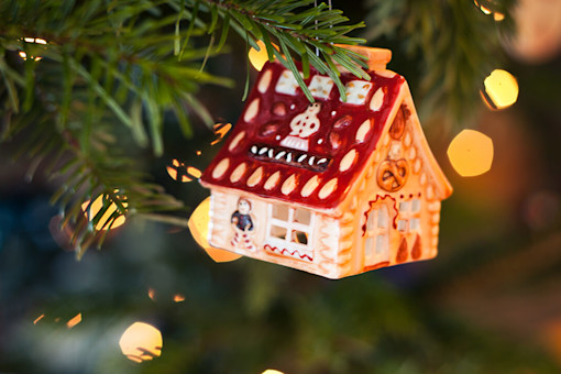 House decoration hanging on Christmas tree