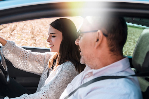 Teen girl taking driving test