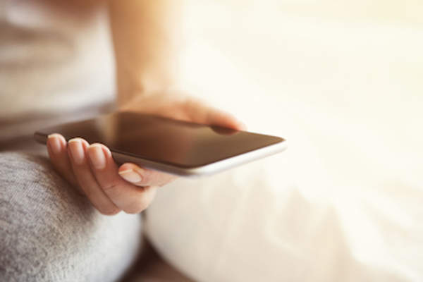 sexting concept phone in hand