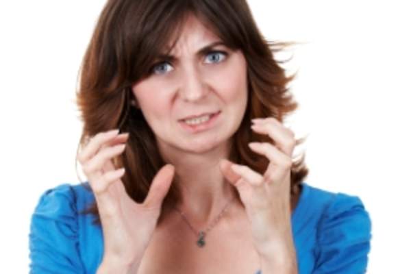Woman frustrated with itching.