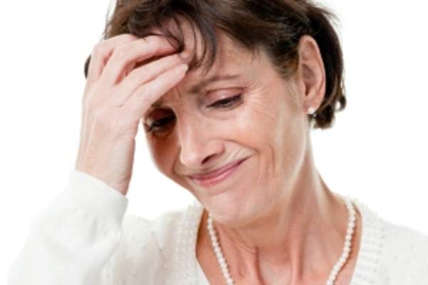 Worried older woman image.