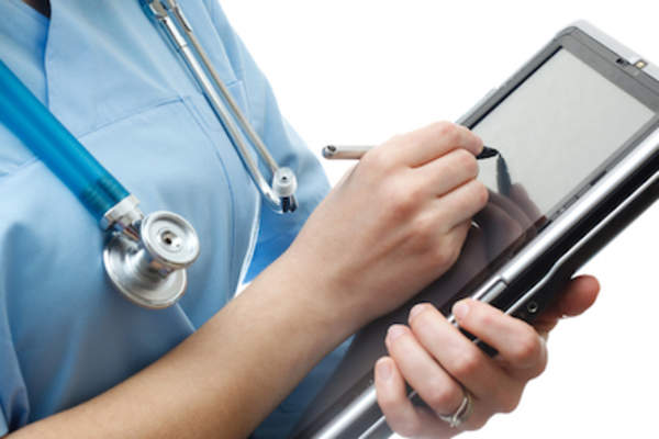 Doctor taking notes.
