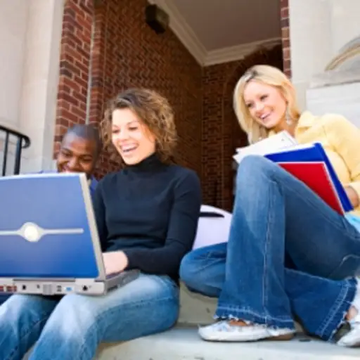 Happy young people working online.