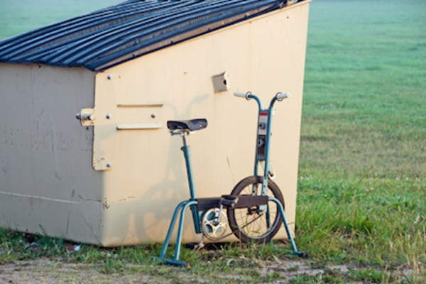 Exercise bike at trash bin