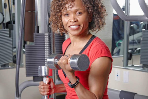 Woman performing bicep curls